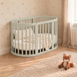 BusyKids MIRACLE 7-in-1 mitwachsendes Babybett mit Matratze